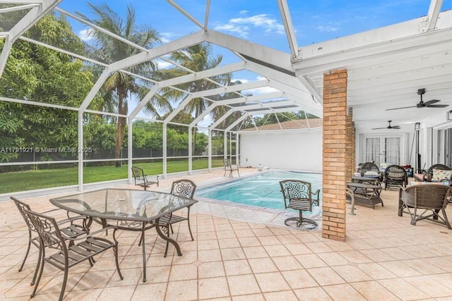 view of pool featuring fence, a fenced in pool, french doors, a ceiling fan, and a patio