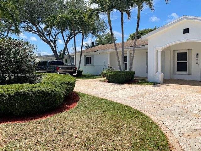 8241 SW 146th St, Palmetto Bay, FL 33158 - view of front facade with stucco siding