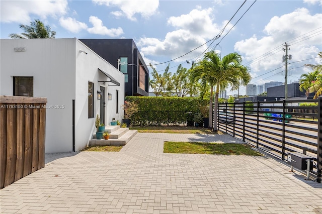view of patio / terrace featuring fence