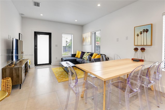 dining area with light tile patterned floors, recessed lighting, and visible vents