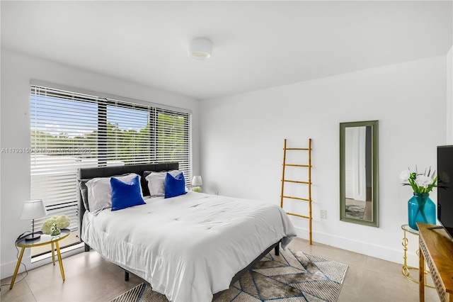 bedroom with baseboards