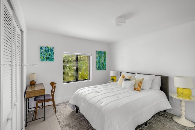 tiled bedroom with baseboards