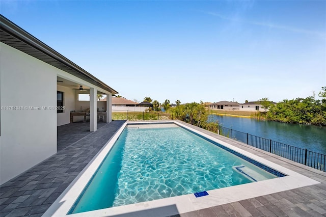 1427 NW 17th St, Cape Coral, FL 33993 - view of pool with ceiling fan, a fenced backyard, a fenced in pool, a water view, and a patio area