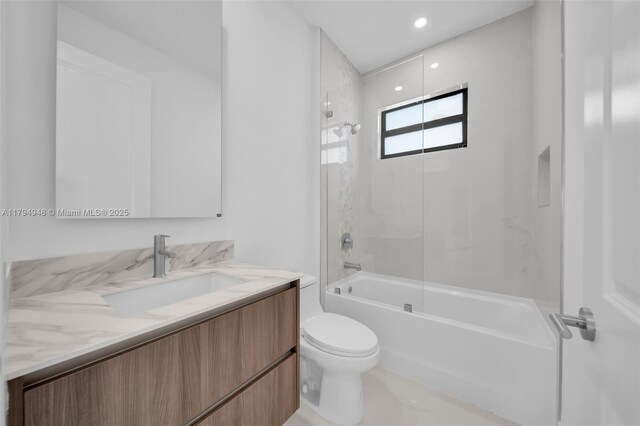 1427 NW 17th St, Cape Coral, FL 33993 - full bathroom featuring vanity, toilet, and tub / shower combination