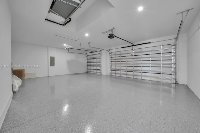 1427 NW 17th St, Cape Coral, FL 33993 - garage with a garage door opener and electric panel