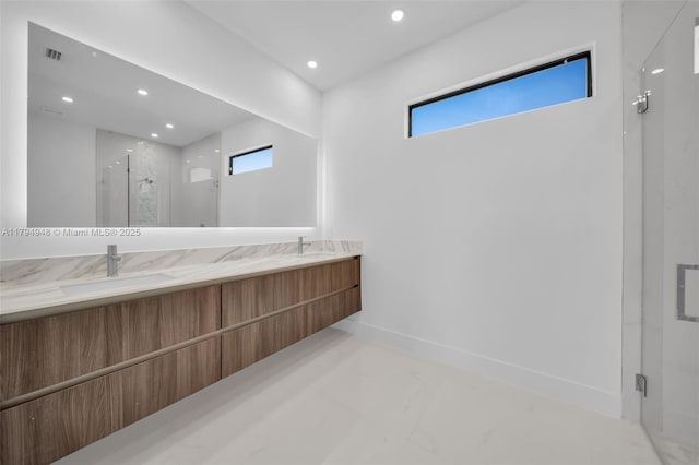 1427 NW 17th St, Cape Coral, FL 33993 - full bathroom with recessed lighting, double vanity, a marble finish shower, and a sink