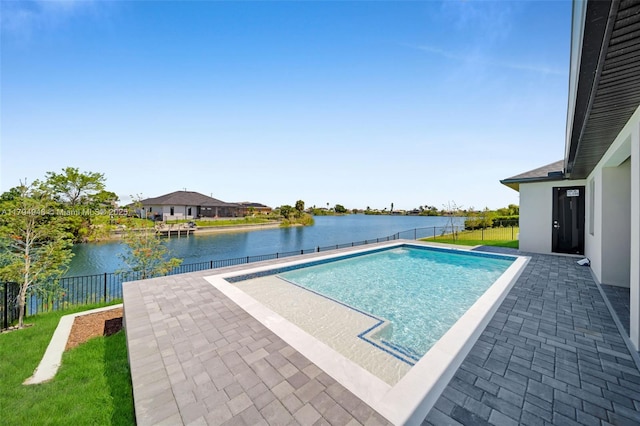 1427 NW 17th St, Cape Coral, FL 33993 - view of pool featuring a water view, a fenced in pool, a patio, and a fenced backyard