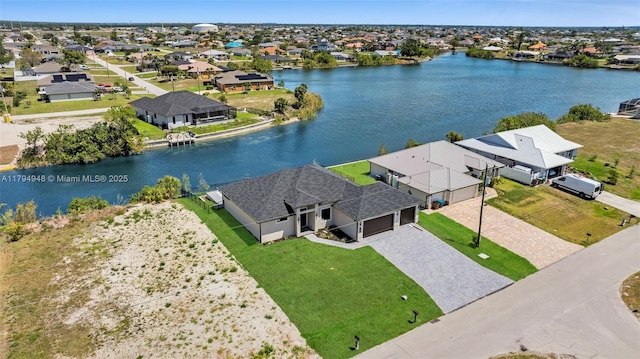 1427 NW 17th St, Cape Coral, FL 33993 - drone / aerial view with a water view and a residential view
