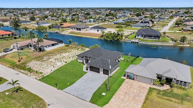 1427 NW 17th St, Cape Coral, FL 33993 - bird's eye view featuring a water view and a residential view