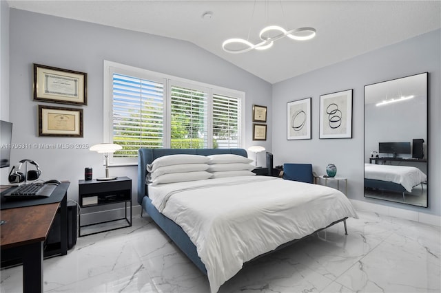 bedroom with lofted ceiling, a notable chandelier, and marble finish floor
