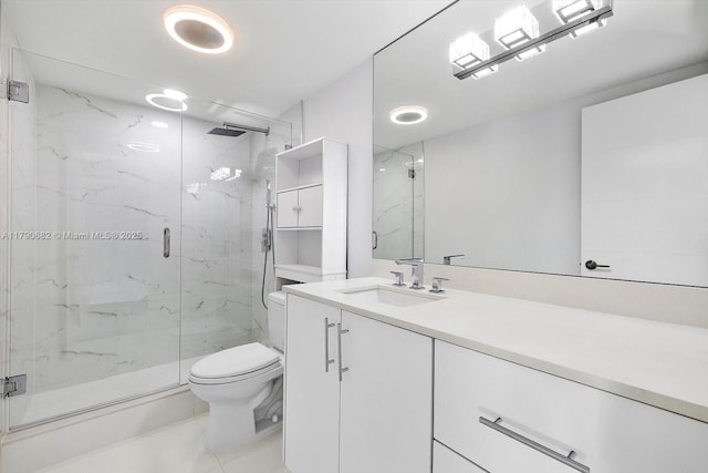 bathroom with toilet, a marble finish shower, and vanity