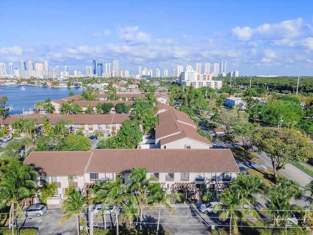 birds eye view of property featuring a city view