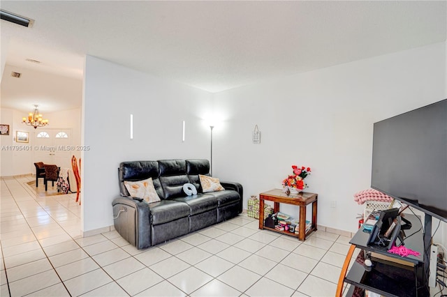 767 NW 122nd Pl, Miami, FL 33182 - living area featuring an inviting chandelier, light tile patterned floors, and visible vents