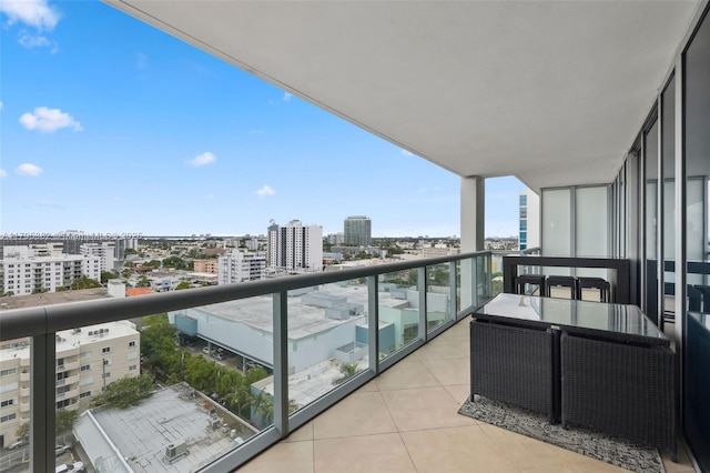 balcony featuring a city view