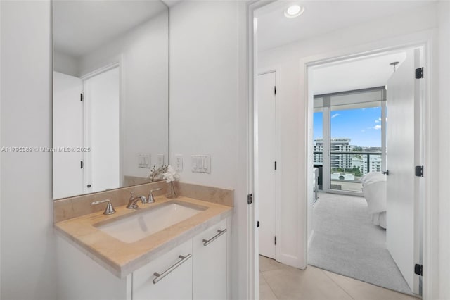 bathroom with vanity and tile patterned flooring