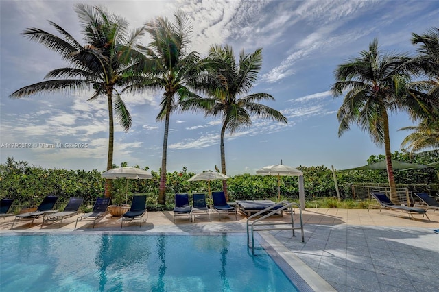 pool with a patio