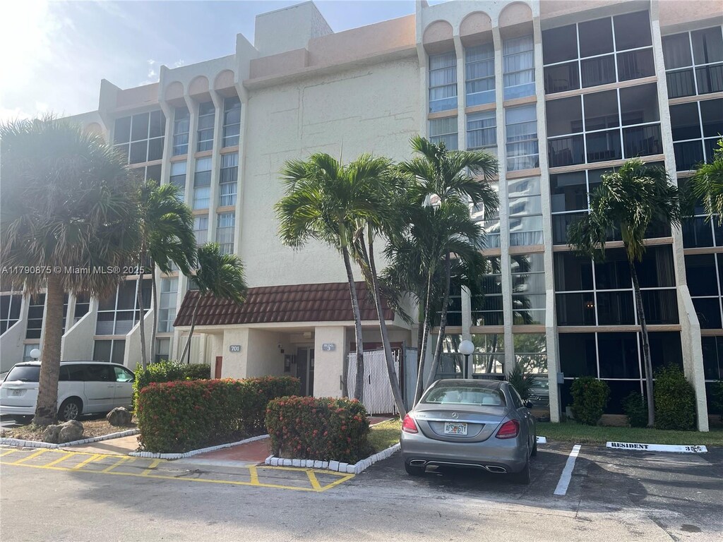 701 Three Islands Blvd Unit 409, Hallandale Beach, FL 33009 - view of property with uncovered parking