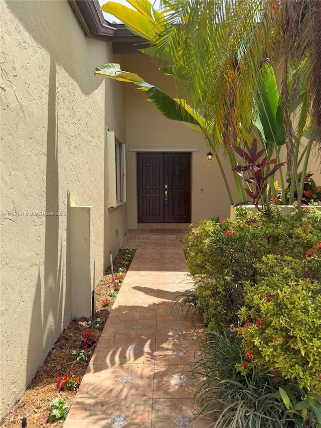 13150 SW 106th St, Miami, FL 33186 - entrance to property featuring stucco siding