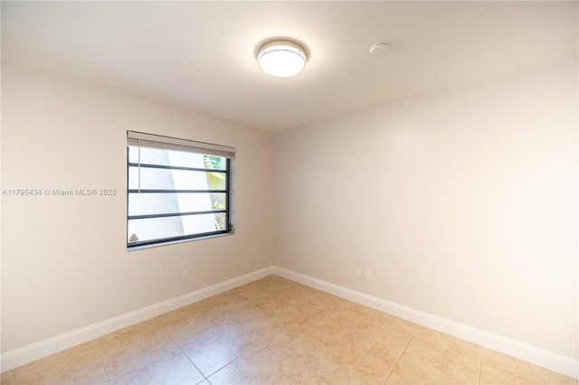 13150 SW 106th St, Miami, FL 33186 - empty room featuring baseboards and light tile patterned flooring