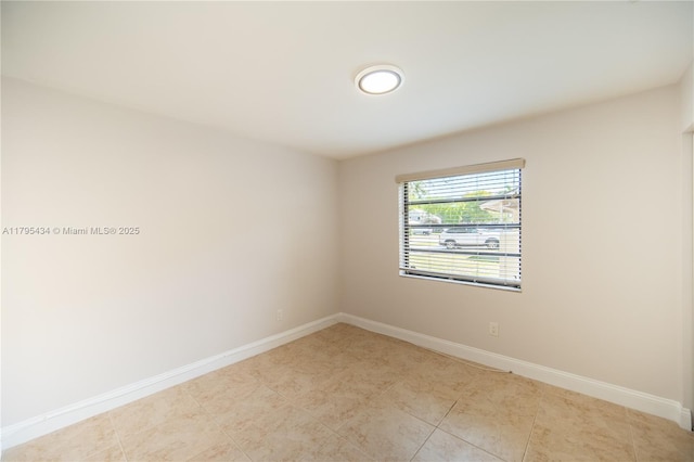 13150 SW 106th St, Miami, FL 33186 - spare room featuring light tile patterned flooring and baseboards