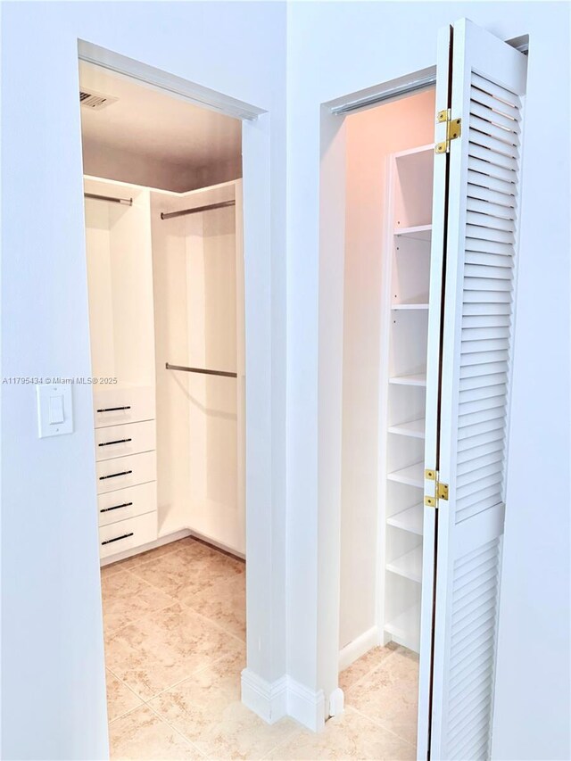 13150 SW 106th St, Miami, FL 33186 - walk in closet with tile patterned floors and visible vents