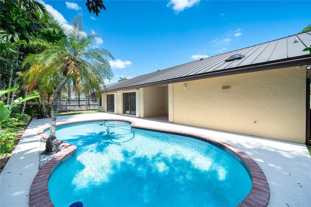 13150 SW 106th St, Miami, FL 33186 - view of swimming pool featuring fence, a fenced in pool, and a patio