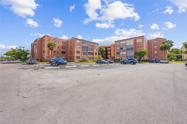 2861 Somerset Dr Unit 104, Lauderdale Lakes, FL 33311 - view of property with uncovered parking