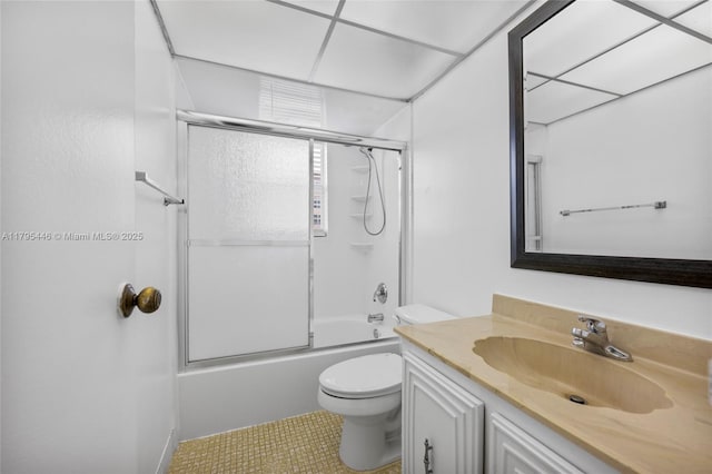 2861 Somerset Dr Unit 104, Lauderdale Lakes, FL 33311 - bathroom featuring vanity, combined bath / shower with glass door, tile patterned flooring, and toilet