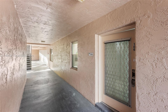 2861 Somerset Dr Unit 104, Lauderdale Lakes, FL 33311 - view of exterior entry featuring stucco siding