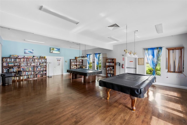 2861 Somerset Dr Unit 104, Lauderdale Lakes, FL 33311 - recreation room with wood finished floors, pool table, and a healthy amount of sunlight