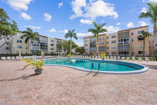 2861 Somerset Dr Unit 104, Lauderdale Lakes, FL 33311 - pool with a patio area and fence