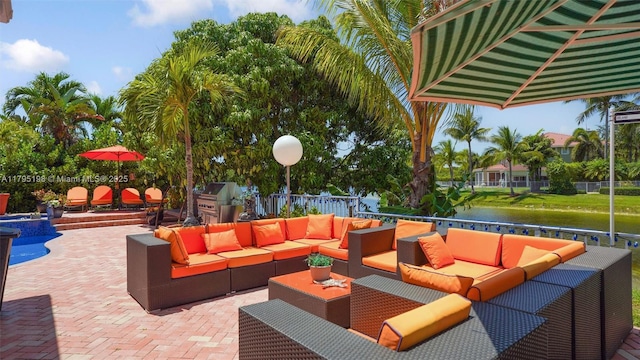 12307 NW 49th St, Coral Springs, FL 33076 - view of patio / terrace with outdoor lounge area, a water view, and grilling area