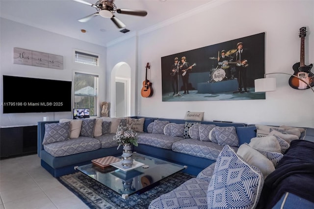 12307 NW 49th St, Coral Springs, FL 33076 - tiled living area featuring arched walkways, ornamental molding, and a ceiling fan