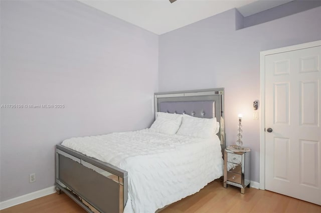 12307 NW 49th St, Coral Springs, FL 33076 - bedroom with wood finished floors and baseboards