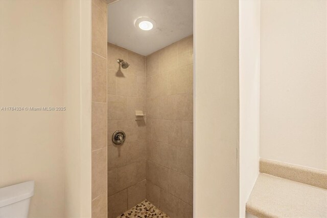 26136 Explorer St, Punta Gorda, FL 33983 - bathroom featuring toilet and tiled shower