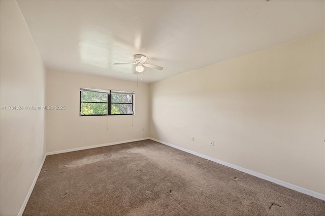 26136 Explorer St, Punta Gorda, FL 33983 - carpeted spare room with baseboards and a ceiling fan
