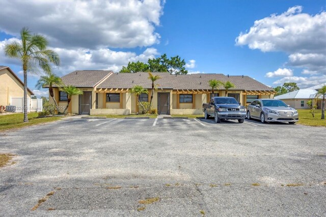 26136 Explorer St, Punta Gorda, FL 33983 - ranch-style home with uncovered parking and stucco siding