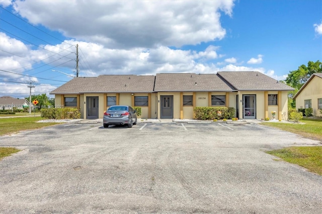 26136 Explorer St, Punta Gorda, FL 33983 - ranch-style home with stucco siding and uncovered parking
