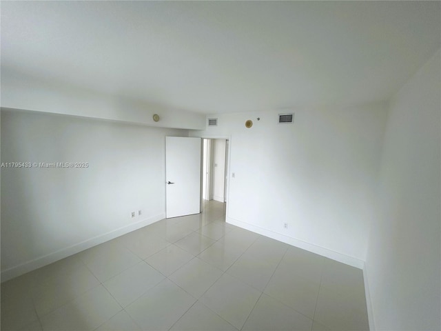 325 S Biscayne Blvd Unit 2917, Miami, FL 33131 - tiled spare room with baseboards