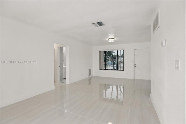 6800 Hope St, Hollywood, FL 33024 - empty room with visible vents and tile patterned flooring