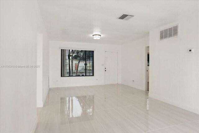 6800 Hope St, Hollywood, FL 33024 - tiled spare room with visible vents