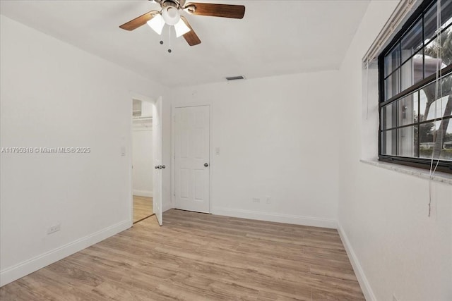 6800 Hope St, Hollywood, FL 33024 - spare room featuring visible vents, a ceiling fan, light wood-style flooring, and baseboards