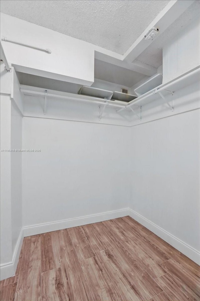 6800 Hope St, Hollywood, FL 33024 - spacious closet with wood finished floors