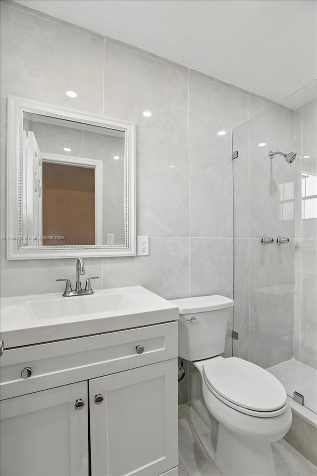 6800 Hope St, Hollywood, FL 33024 - full bath featuring toilet, tile walls, a shower stall, and vanity