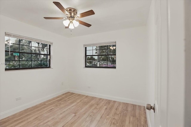 6800 Hope St, Hollywood, FL 33024 - empty room featuring baseboards, a ceiling fan, and light wood-type flooring