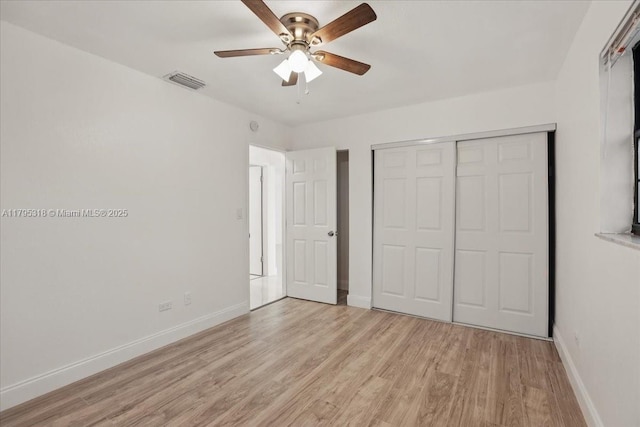 6800 Hope St, Hollywood, FL 33024 - unfurnished bedroom with visible vents, a closet, baseboards, light wood-type flooring, and a ceiling fan