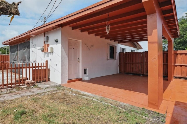6800 Hope St, Hollywood, FL 33024 - exterior space featuring a patio area, stucco siding, and fence