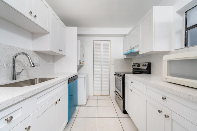 kitchen with white microwave, white cabinetry, under cabinet range hood, stainless steel electric stove, and a sink
