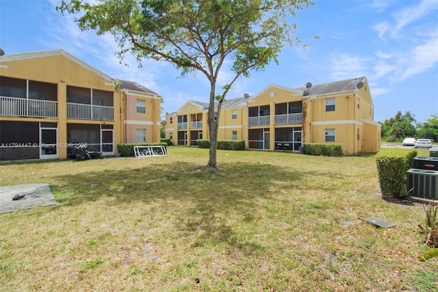 view of community featuring a lawn