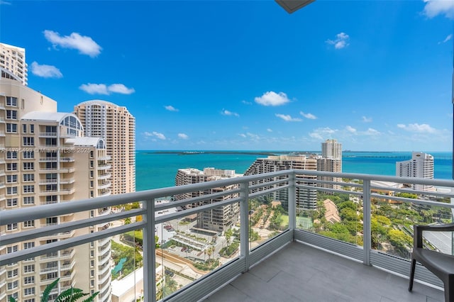balcony featuring a water view